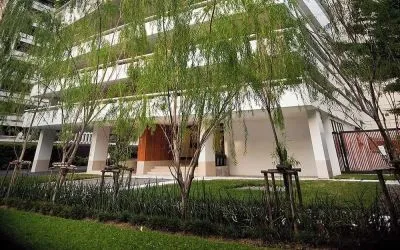 Hotel exterior with garden at Fraser Suites Sukhumvit, Bangkok.