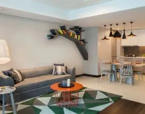 Spacious day use room with lounge and kitchen at Fraser Place Setiabudi Jakarta.