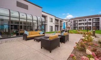 Outdoor lounge and coworking space at Sonesta Select Detroit Auburn Hills.