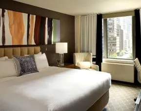 Romantic king room at The Fifty Sonesta Select New York.