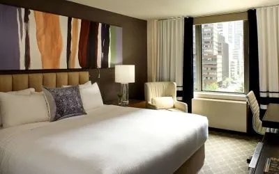 Romantic king room at The Fifty Sonesta Select New York.