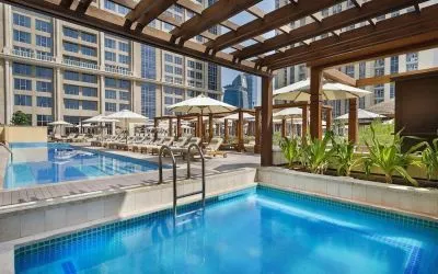 Three outdoor pools at Hilton Dubai Al Habtoor City.