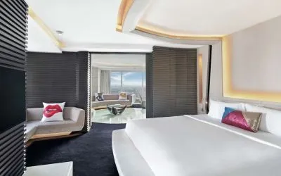 Romantic king room with natural light at V Hotel Dubai.