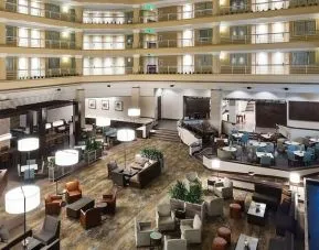 Lobby and coworking space at Embassy Suites By Hilton Denver Tech Center.