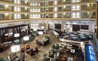 Lobby and coworking space at Embassy Suites By Hilton Denver Tech Center.