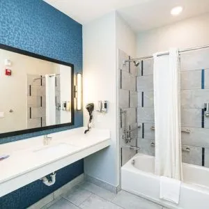 Private bathroom with tub at Palace Inn Blue Laura Koppe Rd.