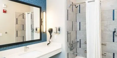 Private bathroom with tub at Palace Inn Blue Laura Koppe Rd.