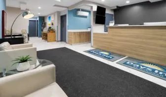 Hotel lobby and lounge at Days Inn By Wyndham Staten Island.