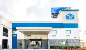 Hotel exterior at Palace Inn Blue IAH East.
