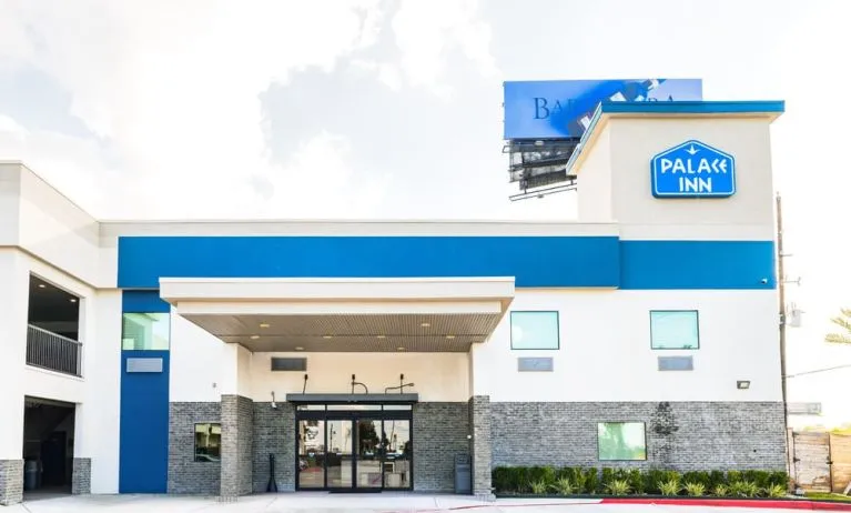Hotel exterior at Palace Inn Blue IAH East.