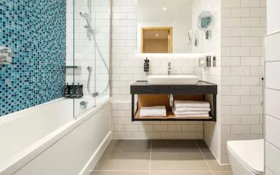 Private bathroom with shower at Holiday Inn Manchester Airport.  