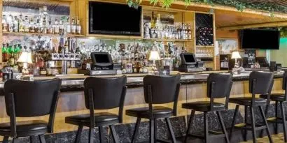 Hotel bar area at Uptown Oasis San Jose Airport.