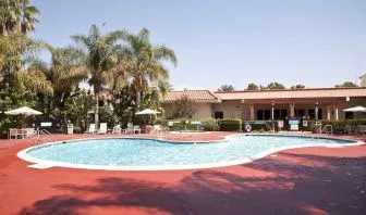 Outdoor pool at Uptown Oasis San Jose Airport.