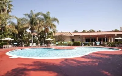 Outdoor pool at Uptown Oasis San Jose Airport.