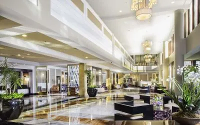 Lobby and hotel entrance at Laguardia Plaza Hotel.