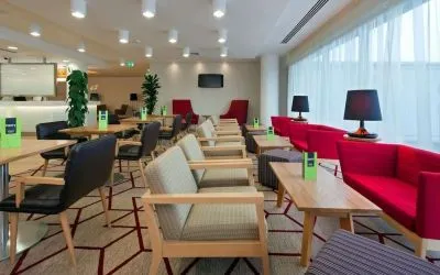 Lounge and dining area at Hampton By Hilton London Gatwick Airport.