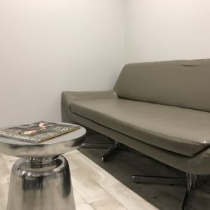 Sofa inside day use room at Ramsey Inn & Suites.