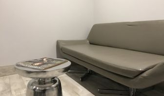 Sofa inside day use room at Ramsey Inn & Suites.