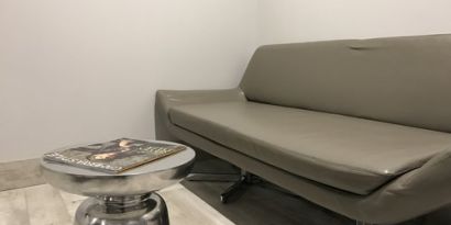 Sofa inside day use room at Ramsey Inn & Suites.