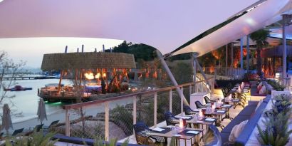 Terrace and outdoor seating at Le Méridien Bodrum Beach Resort.