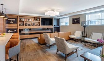 Coworking lounge at Comfort Inn JFK Airport.