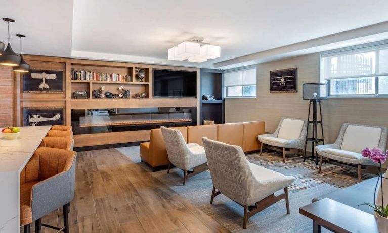 Coworking lounge at Comfort Inn JFK Airport.