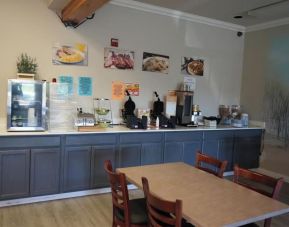 Breakfast available at Coratel Inn And Suites By Jasper Ocean Shores.