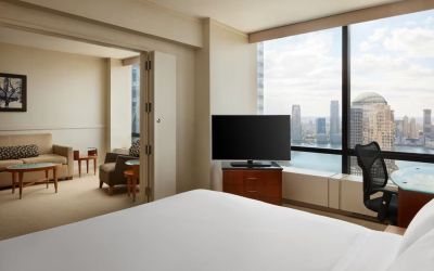 Comfortable day use room with TV and lounge at Millennium Downtown New York.