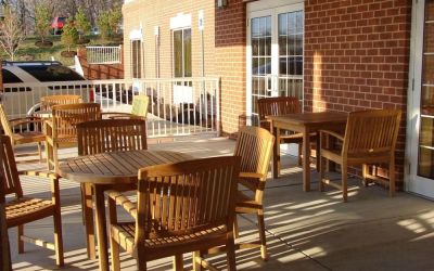 Outdoor seating and terrace at Country Inn & Suites By Radisson, BWI Airport.