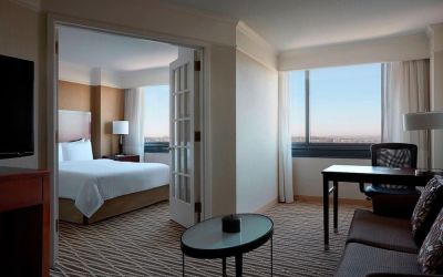 Spacious king suite with lounge area at Washington Dulles Marriott Suites.
