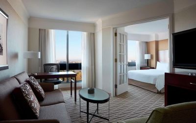 Spacious day use room with lounge and TV at Washington Dulles Marriott Suites.