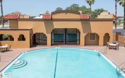 Outdoor pool at Days Inn By Wyndham St Augustine/Historic Downtown.