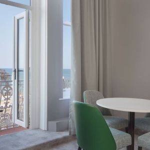 In-room workspace with beautiful view from the balcony at DoubleTree By Hilton Brighton Metropole.