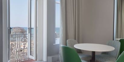 In-room workspace with beautiful view from the balcony at DoubleTree By Hilton Brighton Metropole.