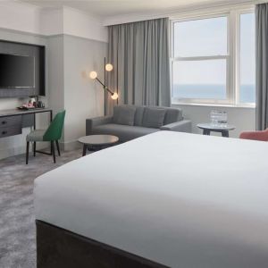 Day use room with work desk and lounge area at DoubleTree By Hilton Brighton Metropole.