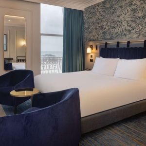 King room with lounge seating at DoubleTree By Hilton Brighton Metropole.