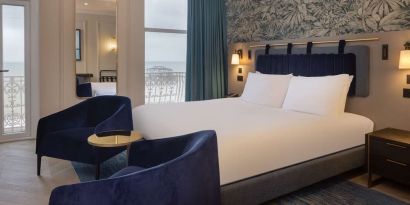 King room with lounge seating at DoubleTree By Hilton Brighton Metropole.