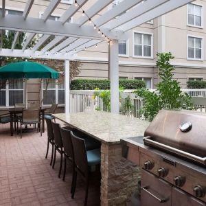 Outdoor barbeque area at Homewood Suites By Hilton Austin NW Near The Domain.