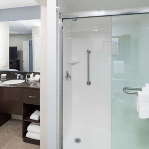 Guest bathroom with shower at Homewood Suites By Hilton Austin NW Near The Domain.