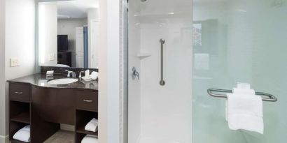 Guest bathroom with shower at Homewood Suites By Hilton Austin NW Near The Domain.