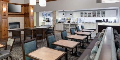 Dining and coworking space at Homewood Suites By Hilton Austin NW Near The Domain.