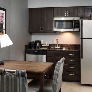 Day room with kitchen at Homewood Suites By Hilton Austin NW Near The Domain.