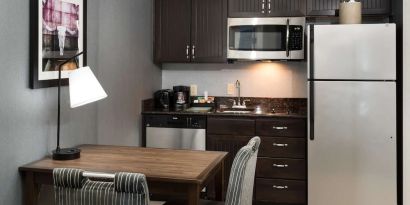 Day room with kitchen at Homewood Suites By Hilton Austin NW Near The Domain.