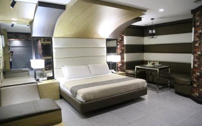 Spacious king room at Victoria Court Las Piñas.