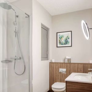 Guest bathroom with shower at DoubleTree By Hilton London - Chelsea.