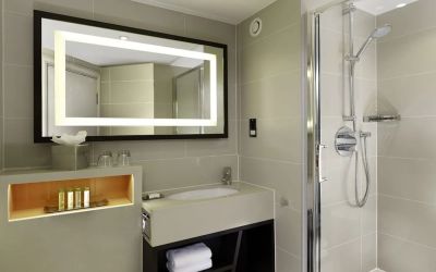 Guest bathroom with shower at DoubleTree By Hilton London - Ealing.