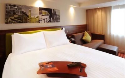 Day use room with sofa at Hampton By Hilton London Luton Airport.