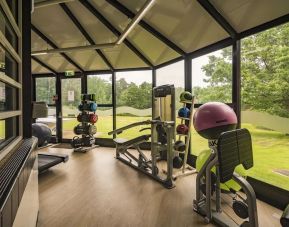 Fitness center available at Hilton Cobham. 
