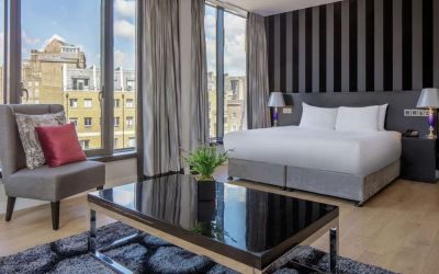 Spacious king suite with city views at DoubleTree by Hilton London Greenwich.