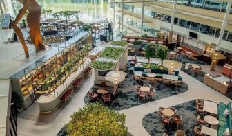 Restaurant and bar view from above at Hilton London Heathrow Airport.